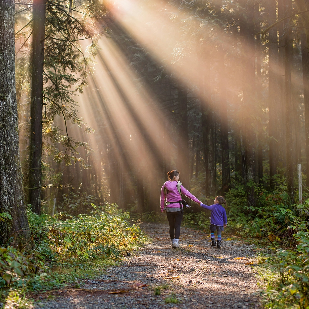 Mom and daughter nature walk.webp