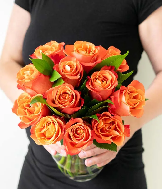 bouquet of orange roses for dia de los muertos