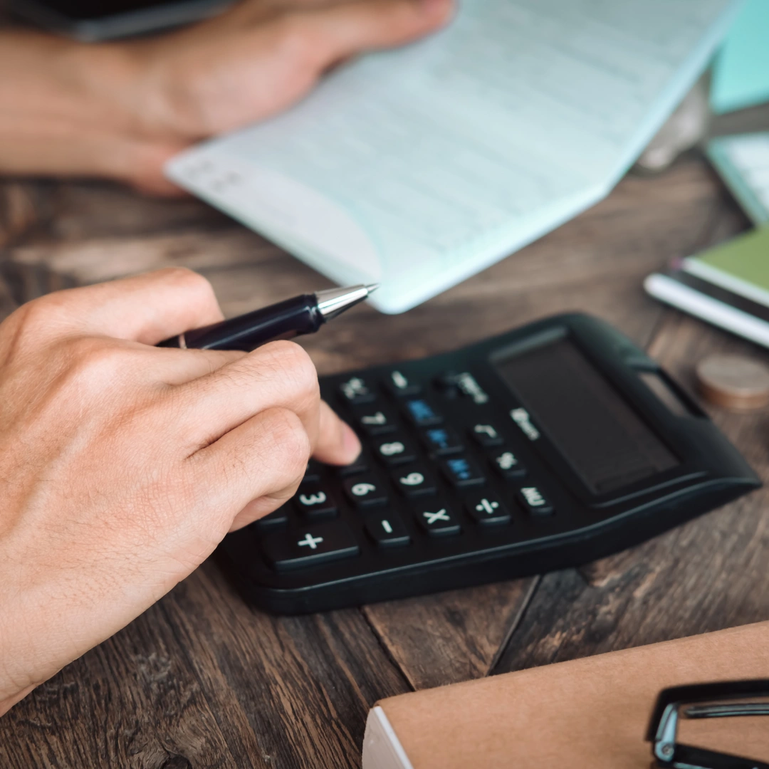 A calculator being used for a debt collection.