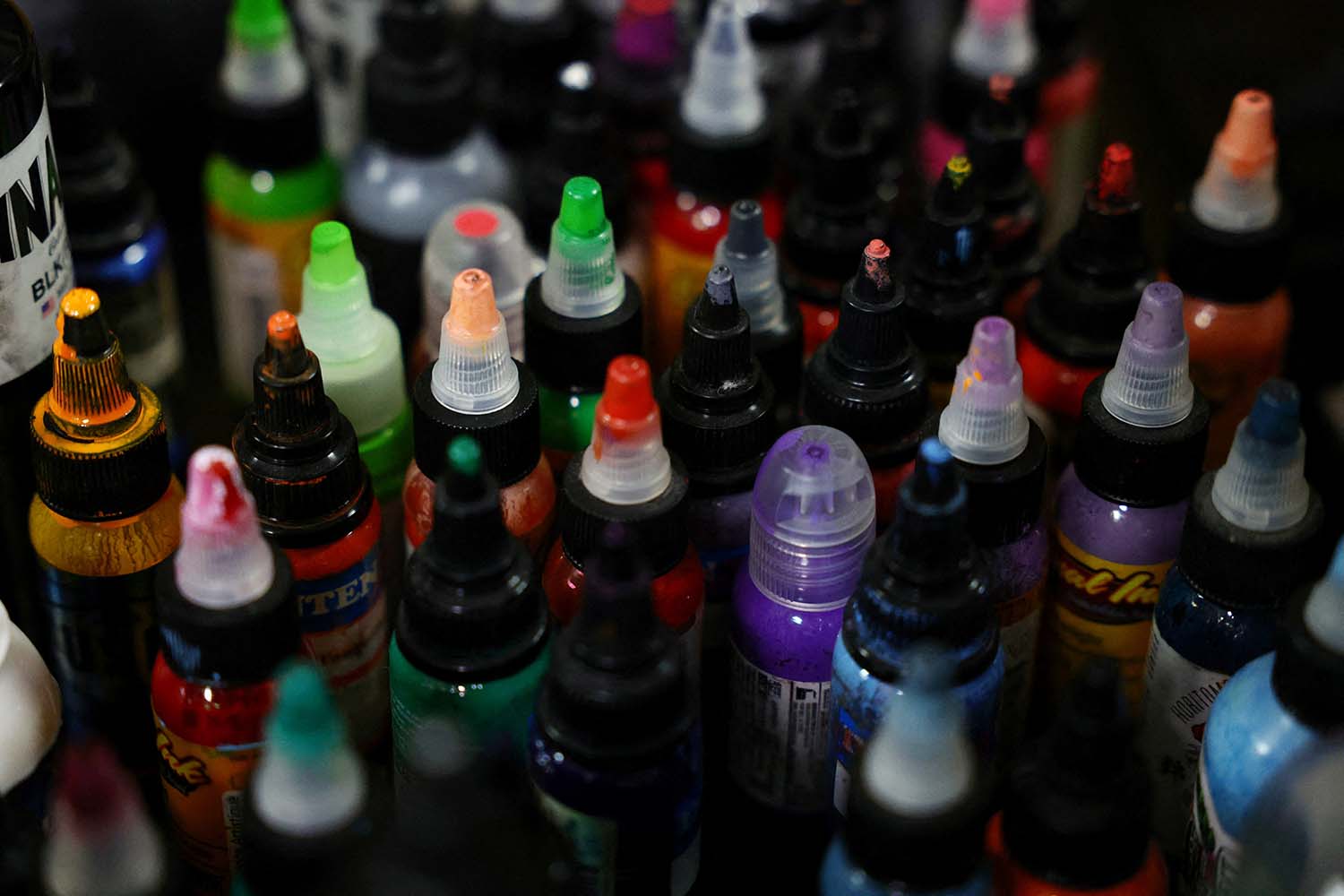 collection of tattoo ink bottles